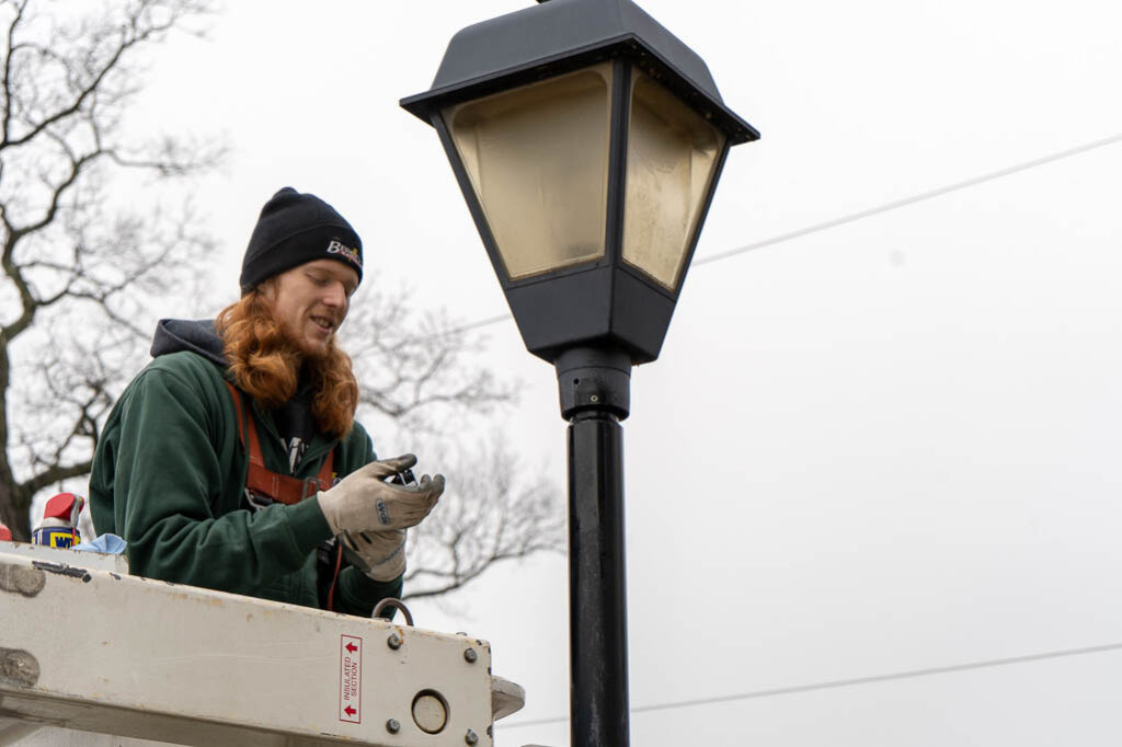 Replacing old street lamps at Univest Bank
